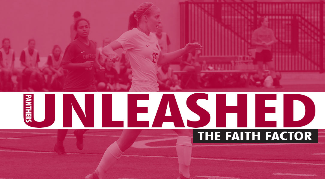 The faith factor: Holloway dribbles in the background