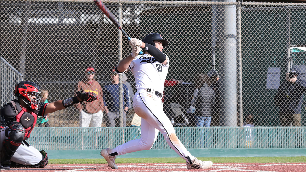 AJ Anzai swings and hits a baseball.