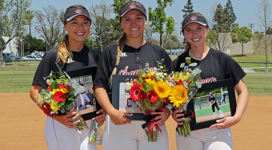 The three Chapman seniors pose for a picture.