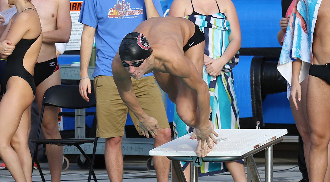 Michael Kulinich dives in to start a race.