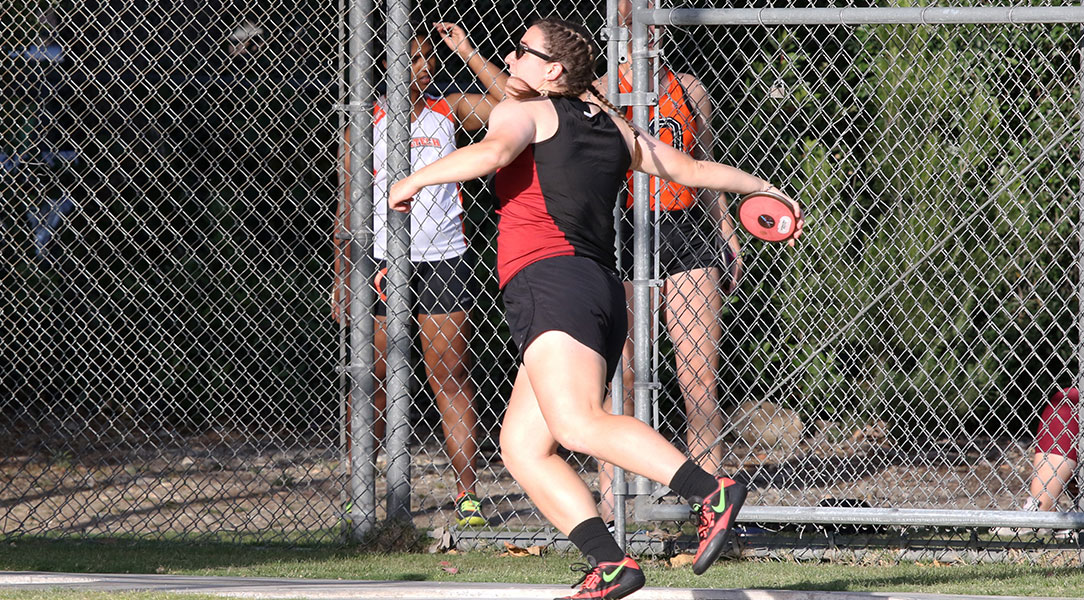 Lauren Miller throws the discus