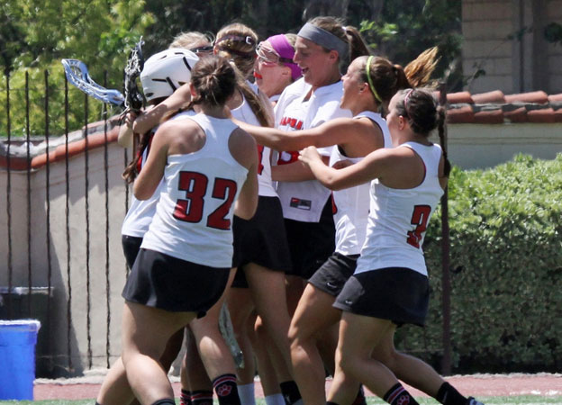 The Panthers celebrate after defeating Oxy 13-10 (photo by Larry Newman)