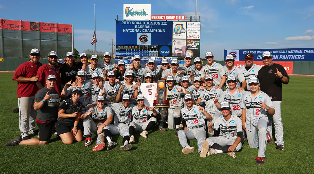 The Chapman baseball team poses with the National Championship trophy.