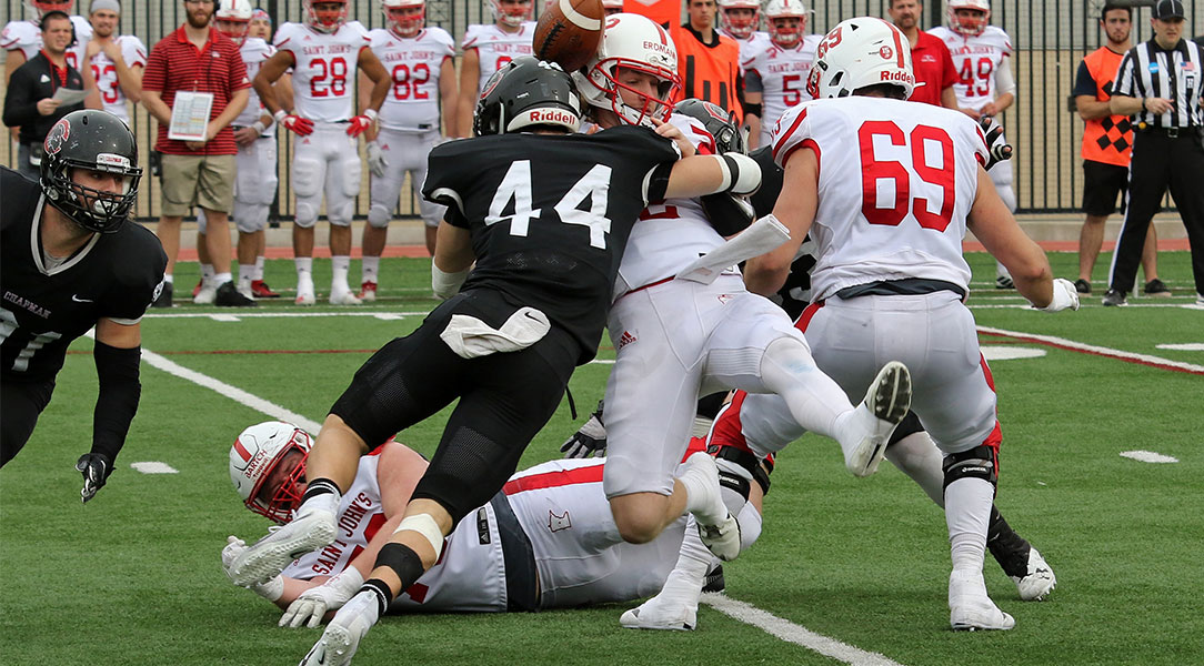 Dillon Keefe forces a fumble while sacking the quarterback.