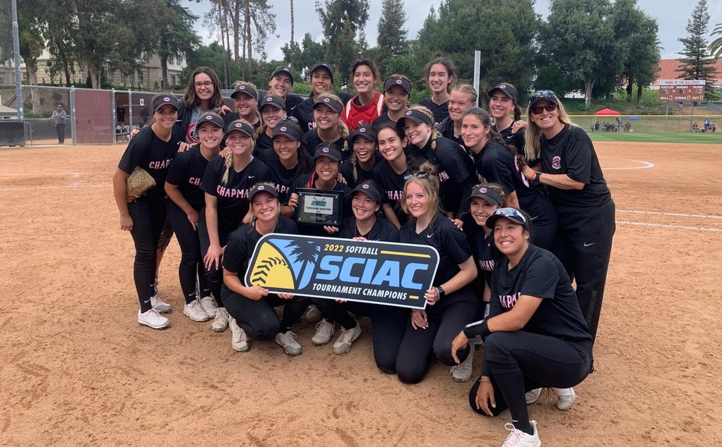 Chapman softball holds up a champions sign after winning the SCIAC Tournament title.