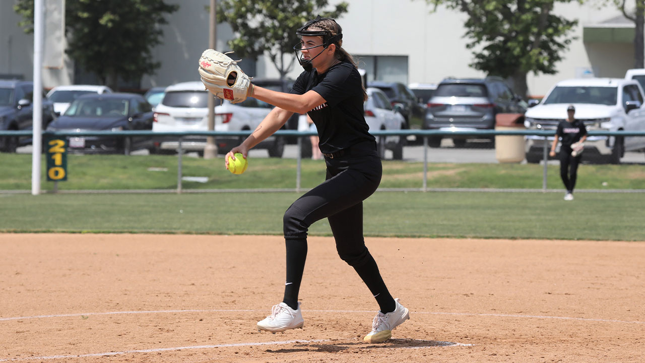 Rose Malen delivers a pitch on the softball field.
