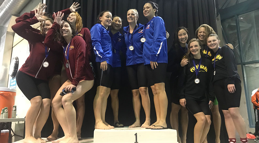 The top 200 free relay teams on the podium.