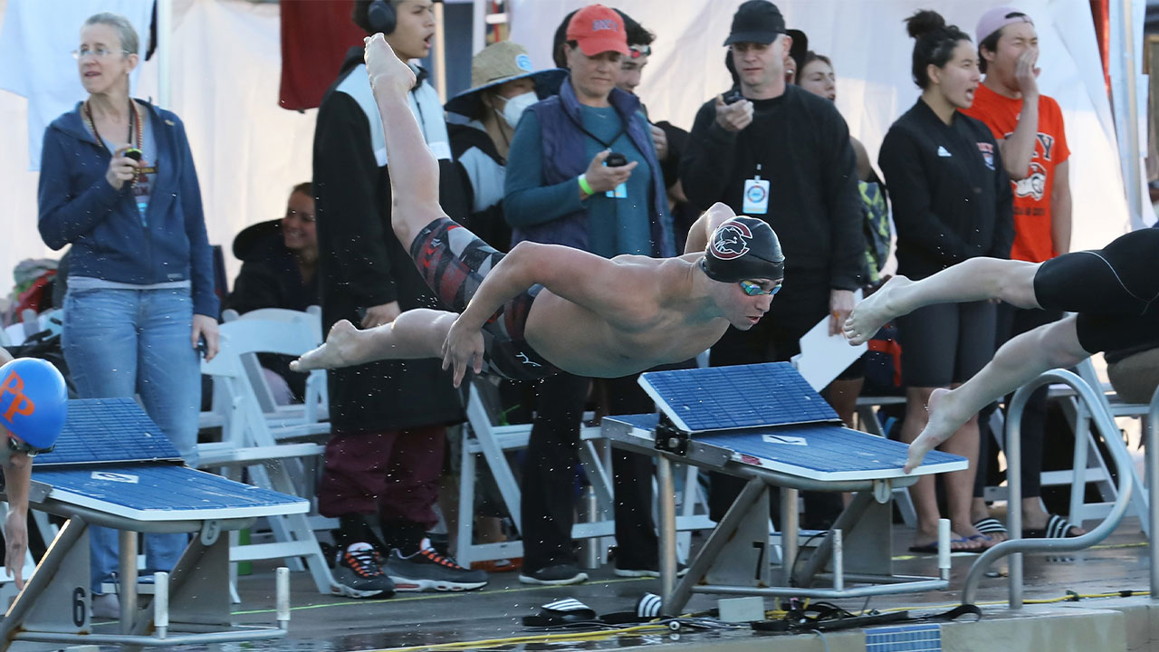 Zach Waddell dives off the block.