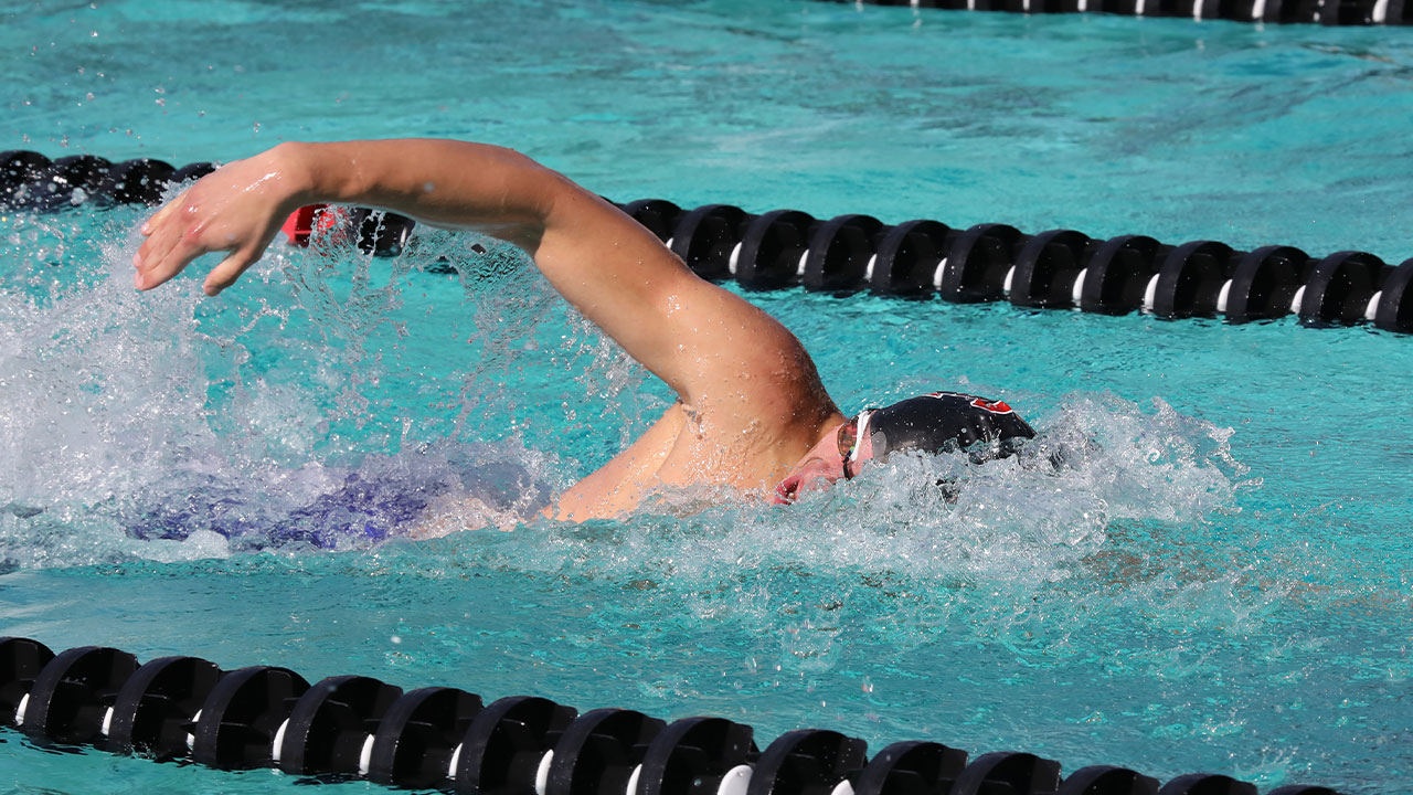 A Chapman swimmer swimming the freestyle.