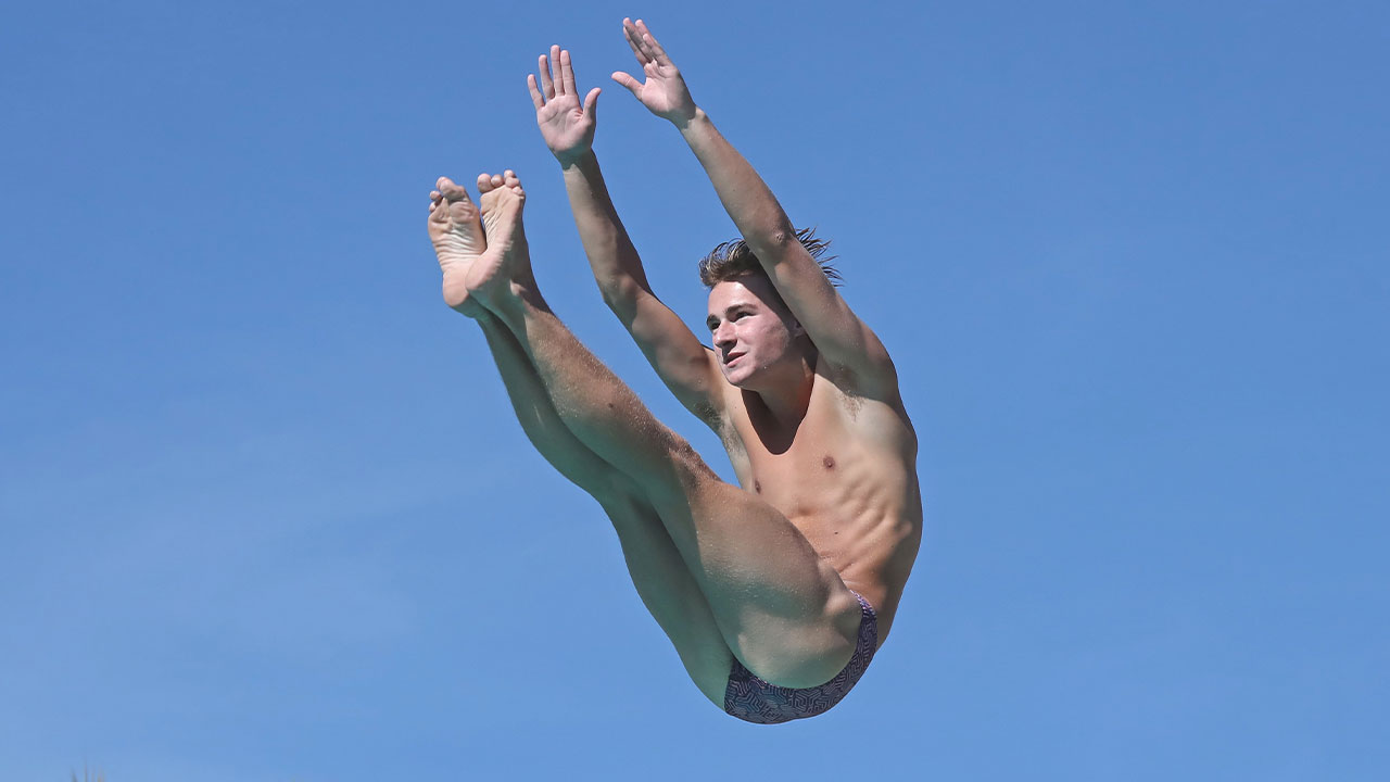 Reid Omilian flipping in midair.