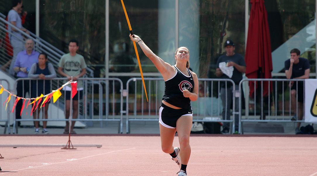 Maija Girardi throws the javelin.