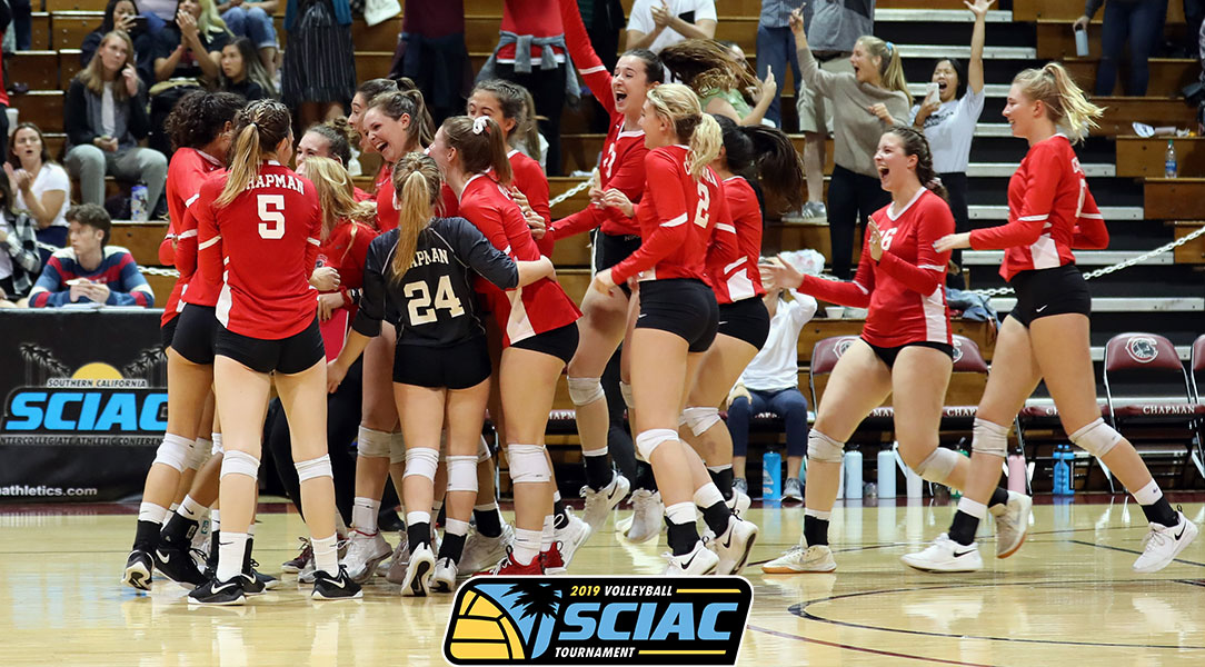 The women's volleyball team celebrates winning the SCIAC Semifinal match.